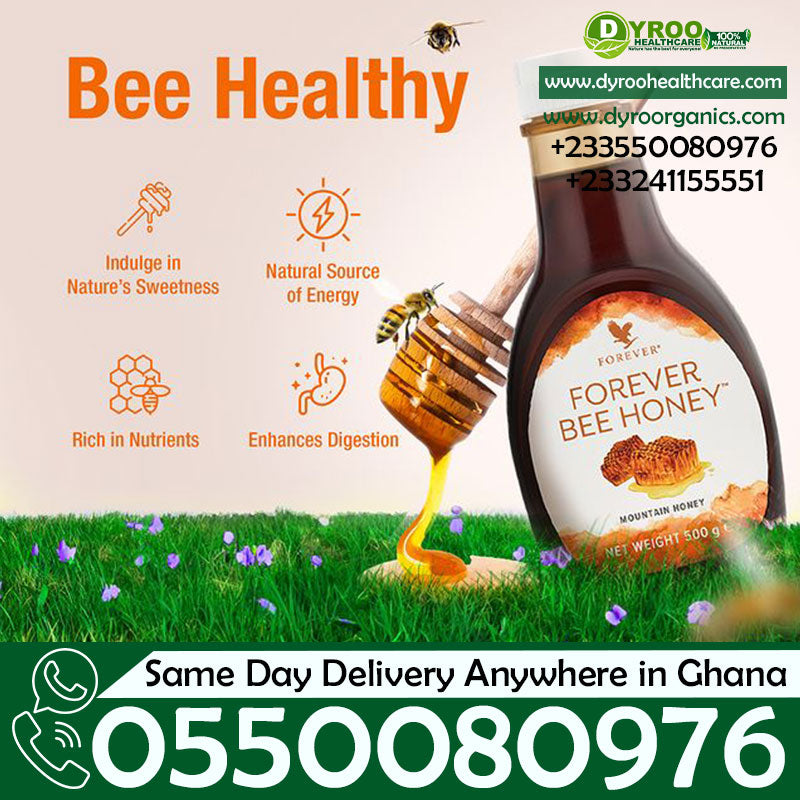 Golden honey syrup in a jar, labeled Forever Living Bee Honey 500g by Dyroo Naturals, with a honey dipper nearby.