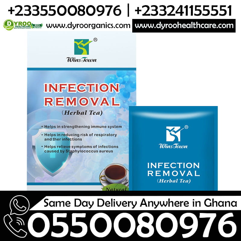 Dyroo Naturals Wins Town Infection Removal Tea in a glass cup, showcasing fresh herbal ingredients and vibrant tea color.